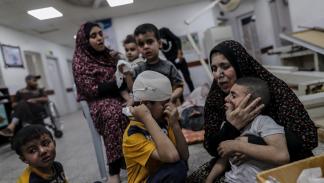 نساء وأطفال في رفح في غزة - 25 إبريل 2024 (جهاد الشرافي/ الأناضول)